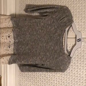 Grey sweater with lace detail at bottom